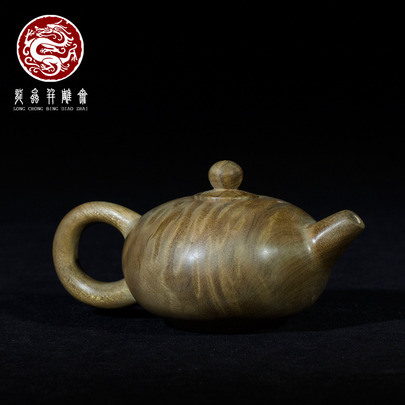 文玩茶壶(核桃雕刻成b的图)